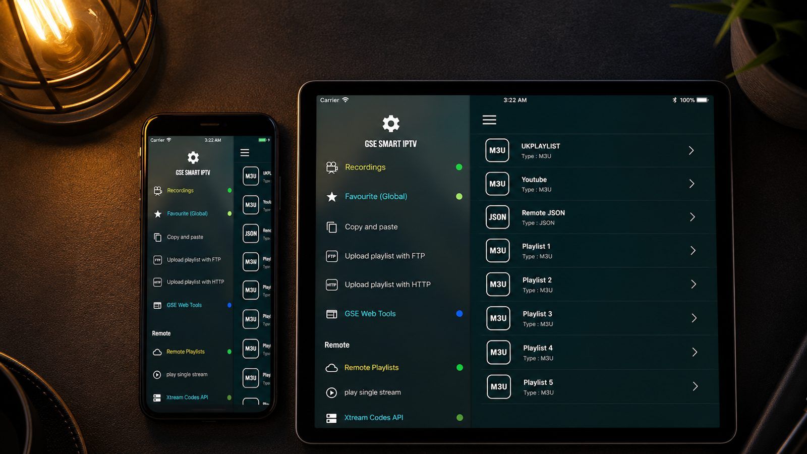 iPhone i iPad s IPTV plejerom pored televizora u zamračenoj dnevnoj sobi