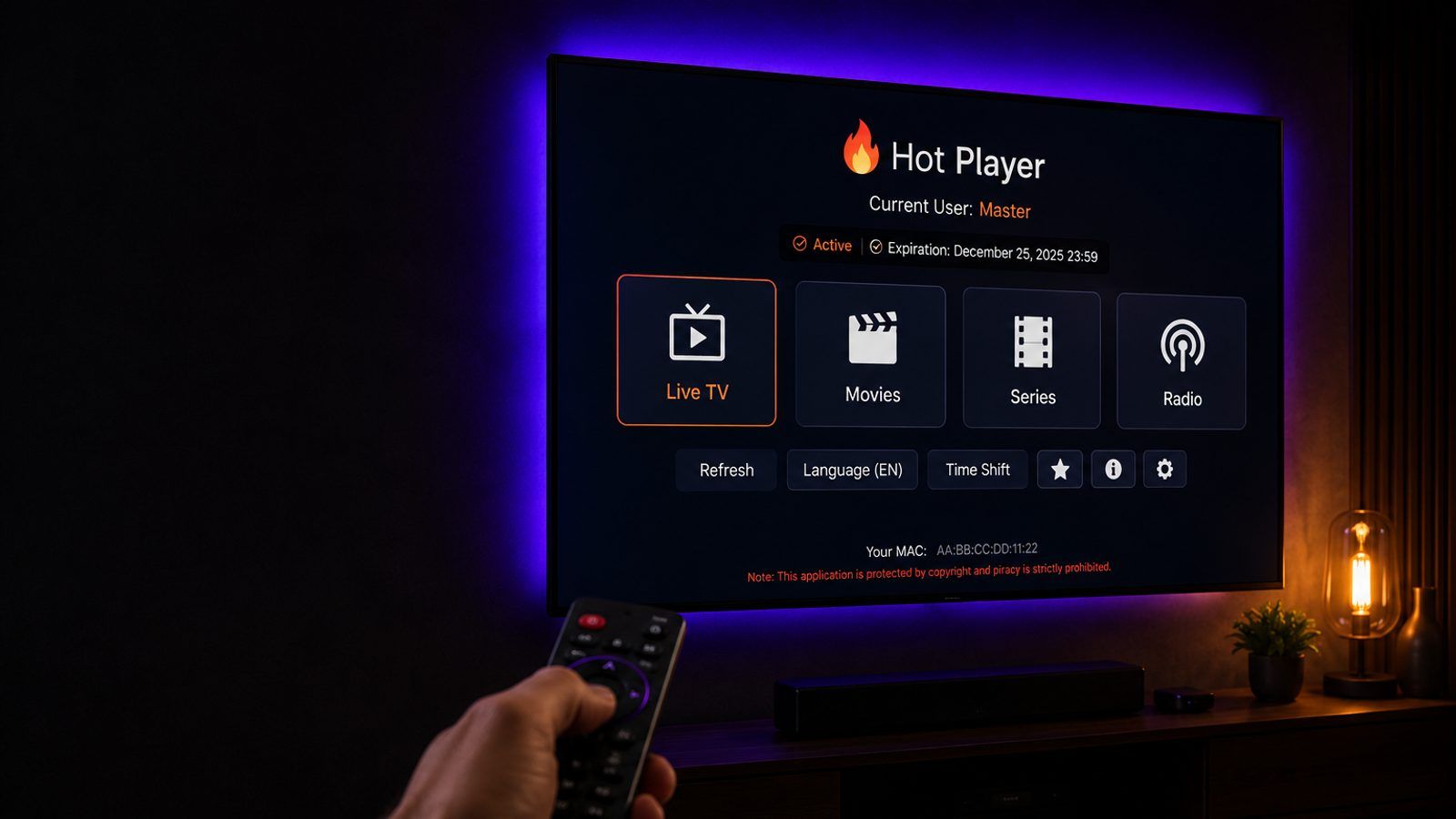 Samsung televizor s aplikacijom za IPTV na početnom ekranu, daljinski u prvom planu